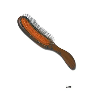 A brush with orange bristles on top of it.