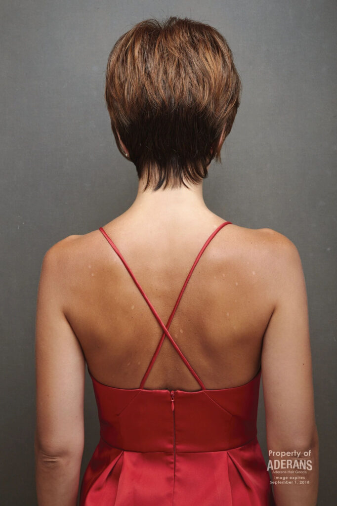 A woman with short hair wearing red lingerie.